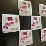 National Day Giveaways in the Shape of a Qatari Passport with magnetic photo