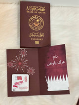 Qatar National Day distributions, Qatar newspaper-shaped card, Qatar gifts.